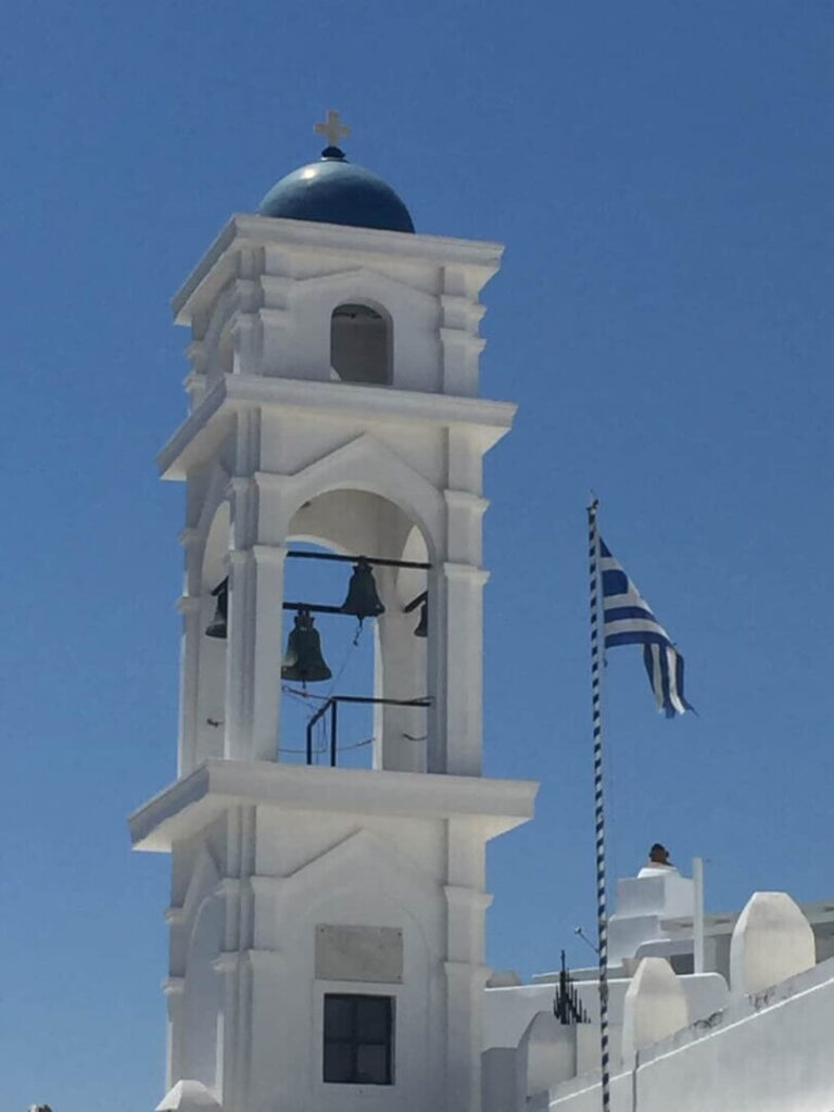 random quintessential white tower in greece