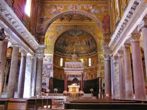 The exquisite interiors of the beautiful Santa Maria in Trastevere church in Rome.