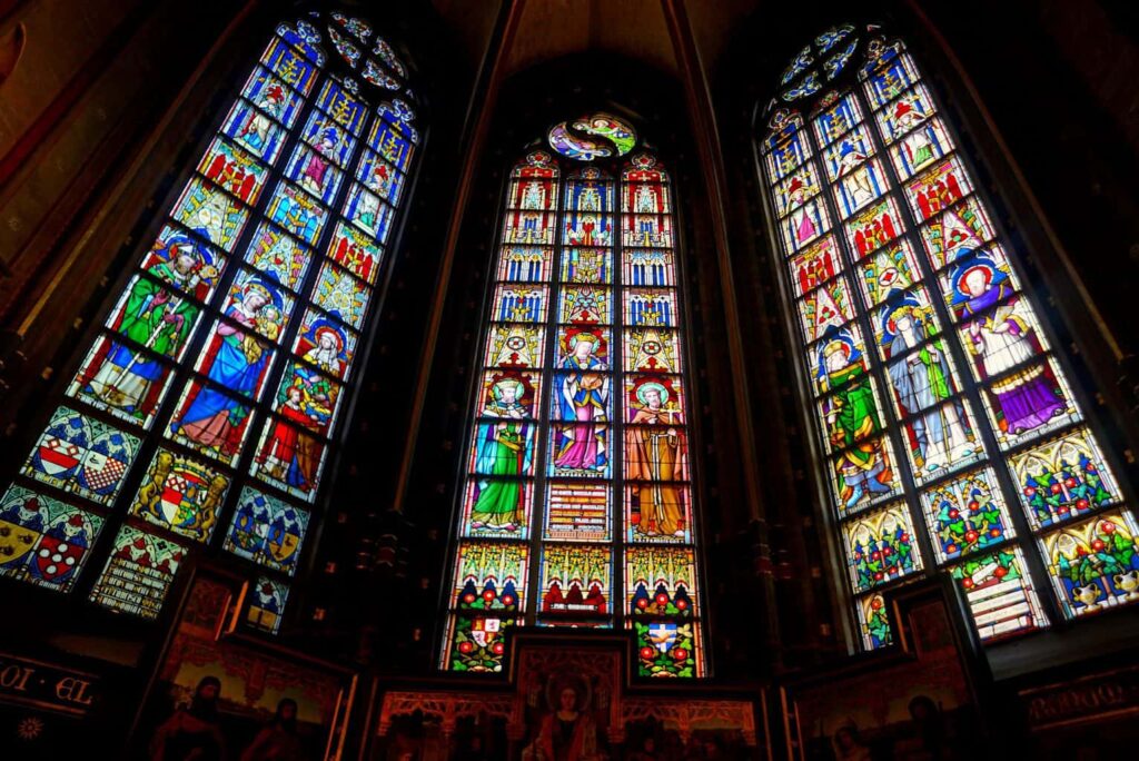 View of the amazing stained glass windows inside the Cathedral of Our Lady. This is one of the best things to do in Antwerp. 
