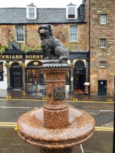 This statue stands outside of Greyfriar's Bobby and commemorates Bobby's undying loyalty to his owner. 