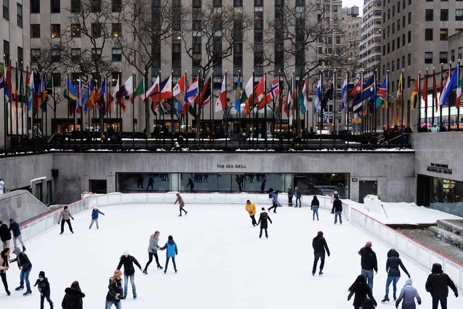 Ice skating at Rockefeller Center in the winter. 
