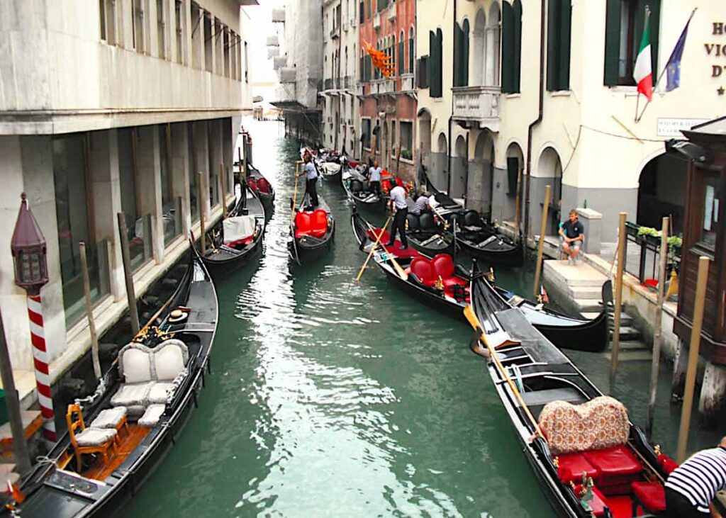 Aerial view of the gondolas floating in the canals of Venice during one of the best ghost tours Venic ehas to offer. 
