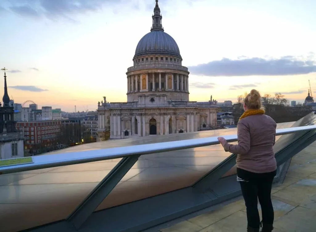 Me looking out at St. Paul's Cathedral witht he sun setting in the background. 