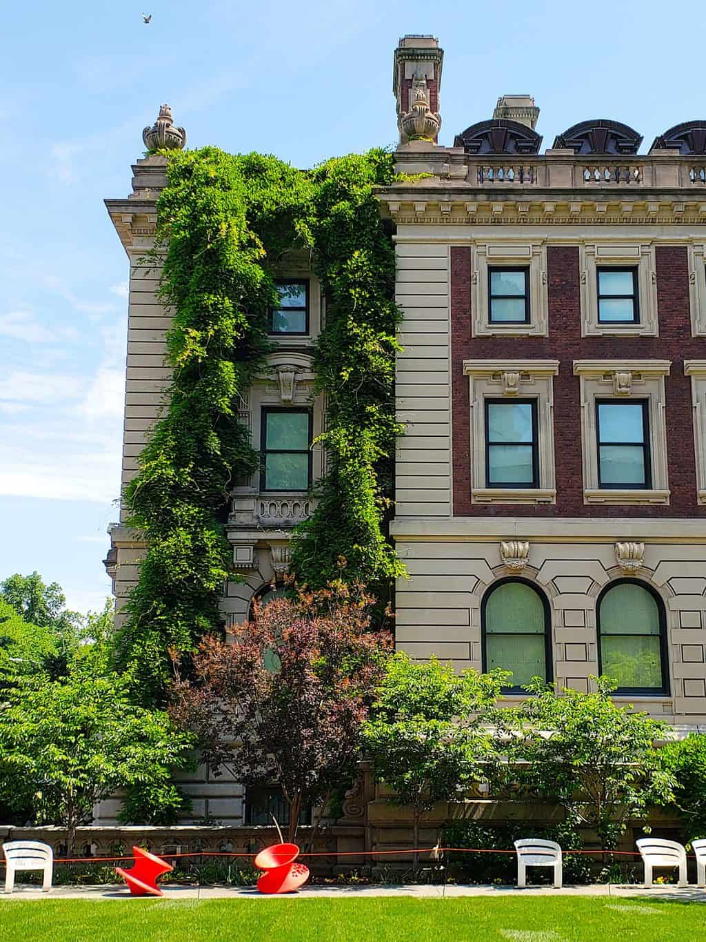 The beautiful green courtyard surrounding Cooper Hewitt Smithsonian Design Museum is a perfect place to chill while enjoying this unusual thing to do in NYC.