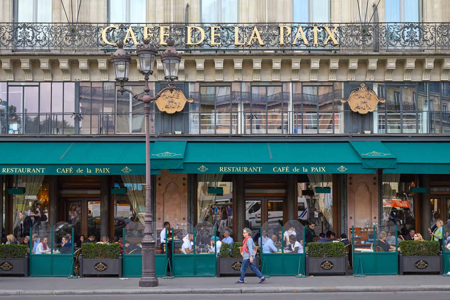 The chic, historic beauty of Cafe de la Paix in Paris.