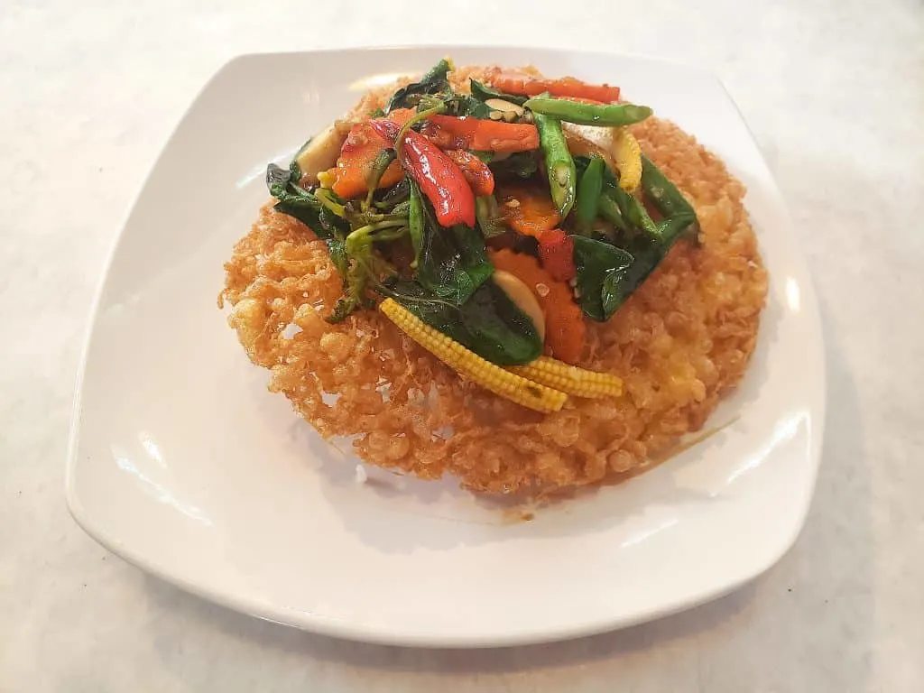 The delicious veggie, Pad Kra Praow that you'll find at Kopi Hya Tai Kee.