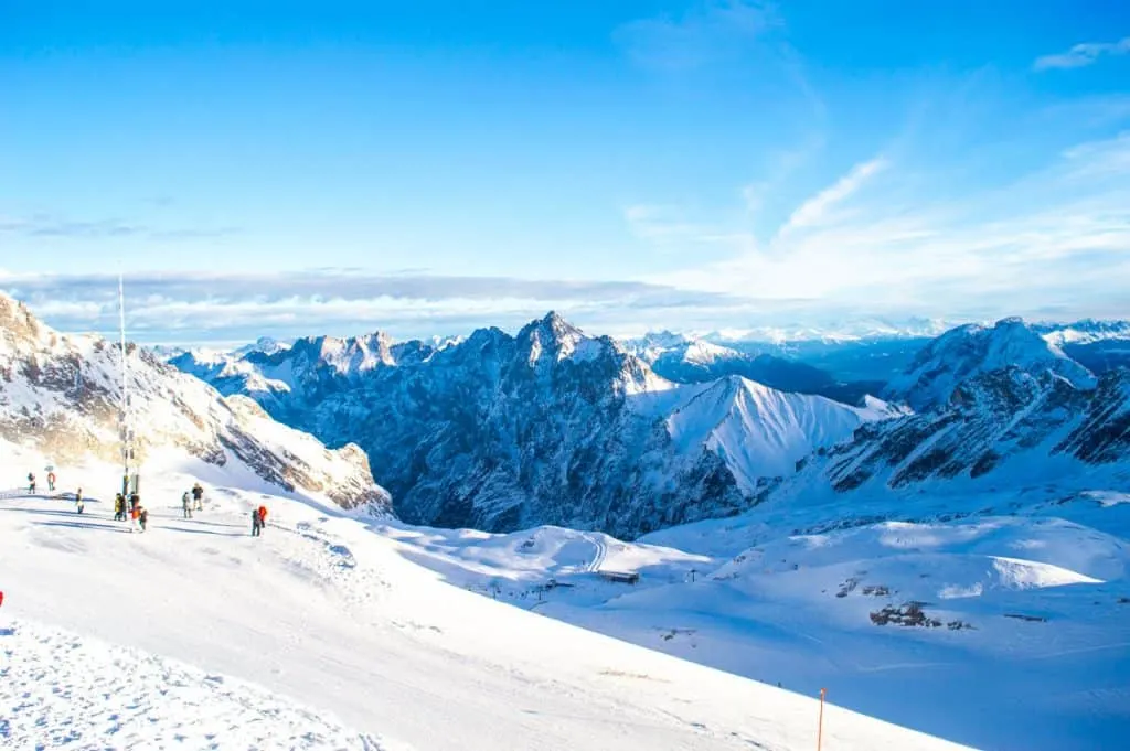 The stunning, snow covered view from the summit of Zugspitze in Germany.