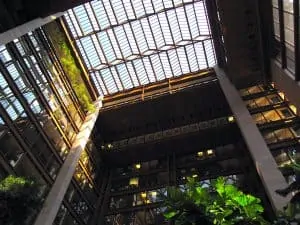 One of the most unusual things to do in NYC is to visit the tropical rainforest that can be found inside the expansive atrium of the Ford Foundation Building in New York City.