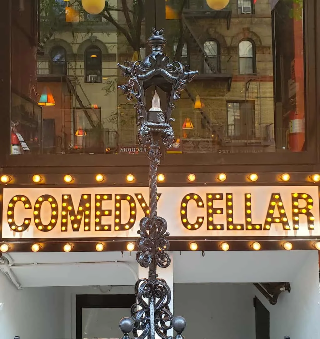 The exterior of NYC's famous comedy cellar, one of the best things to do in Lower Manhattan at night. 