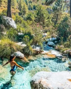The beautiful, turquoise water of the Rio Verde in the Sierras de Tejeda of Spain.