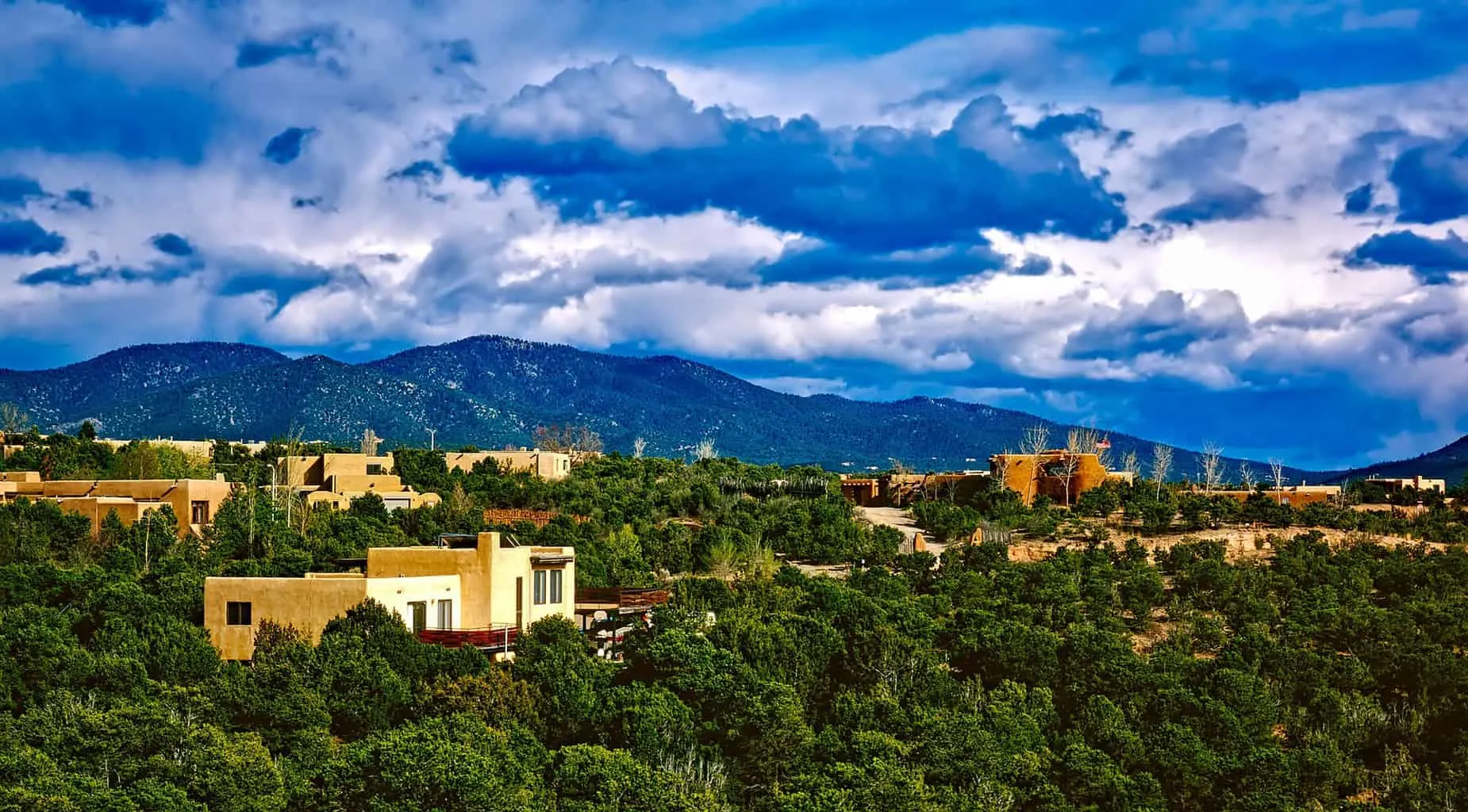 The beautiful, natural landscape of Santa Fe, New Mexico, one of the best places to travel alone in the US.