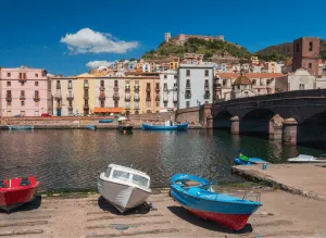 The quaint, coastal charm of Bosa, Italy in Sardinia.