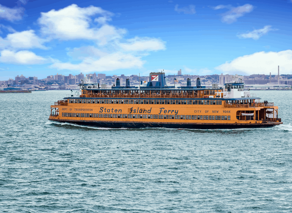 A view of the Staten Island Ferry going from Manhattan to Staten Island. It's also one of the best things to do in Lower Manhattan!