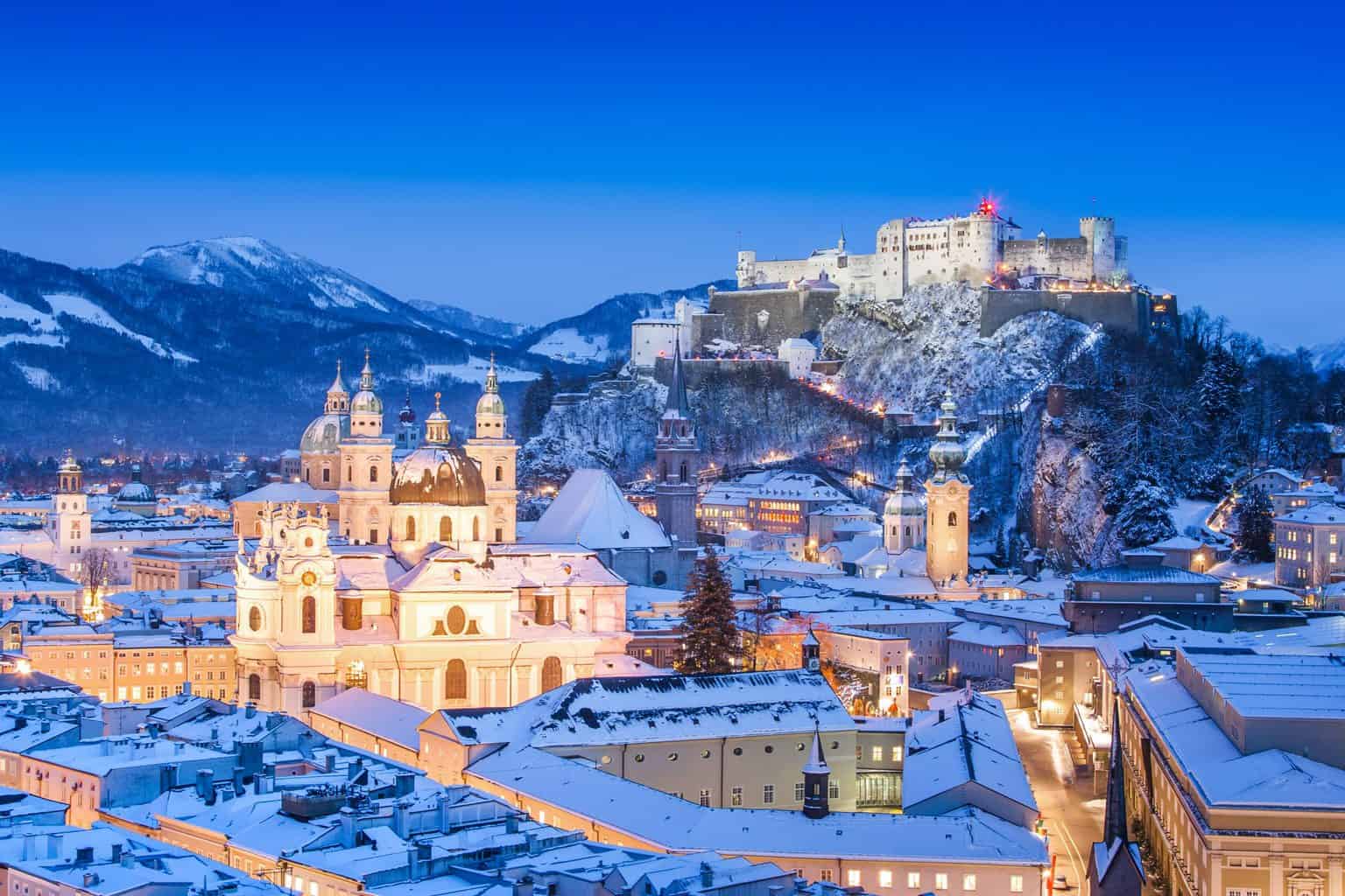 The historic city of Salzburg, Austria under a beautiful blanket of snow. You can easily see why it is one of the best European Christmas destinations. 