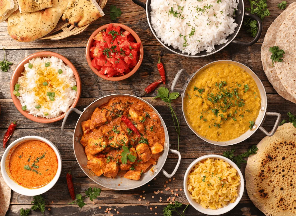Assortment of Indian food that you can sample during one of the best London at night tours. 