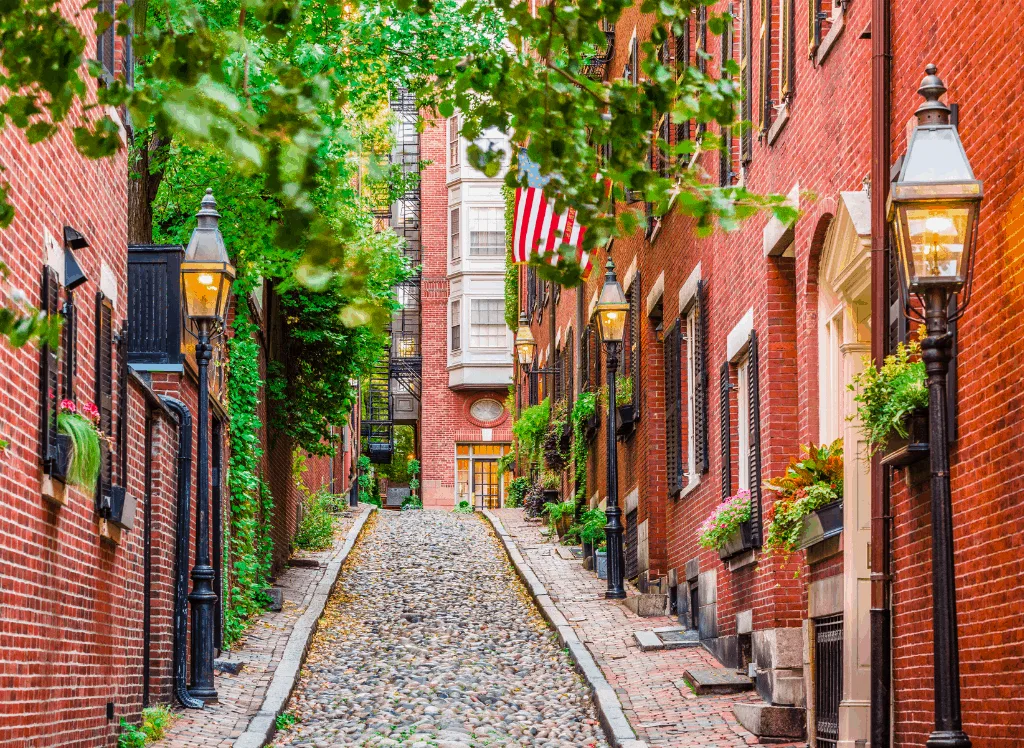 The historic, brick buildings you'll find along the quaint AF Acorn Street in Boston, Massachusetts. 