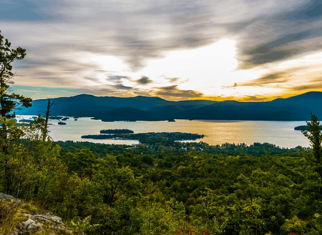 A beautiful panoramic view of Lake George with the sun setting behind the mountains. This is beyond doubt one of the most serene romantic getaways in Upstate New York