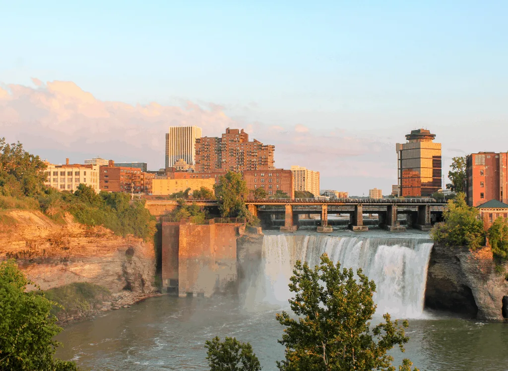 Sunset at High Falls in Rochester, NY, one of the most romantic getaways in upstate New York.