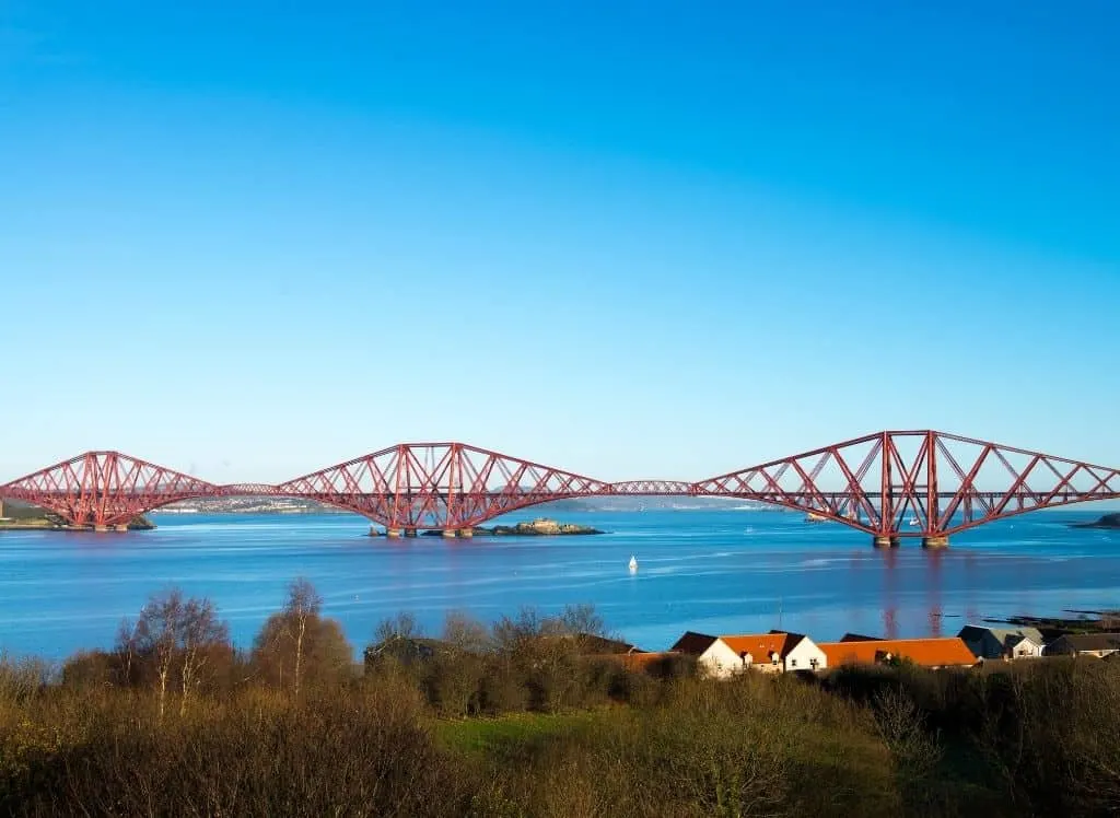 An aerial of the red Forth Bridge just outside of Edinburgh. 