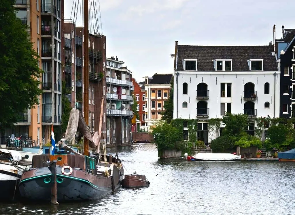 The charming houses and boats of Prinseneiland in Amsterdam. 