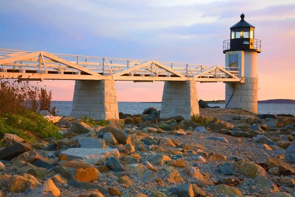 A view of the Marshall Point Lighthouse iat dusk in Maine.