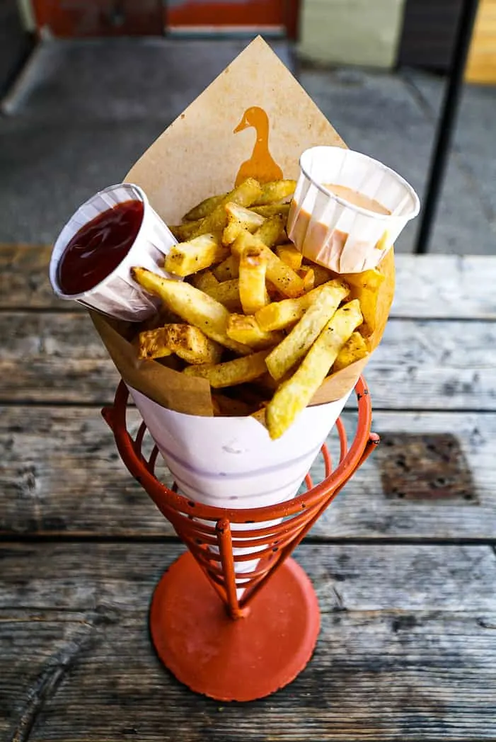 Duck fat fries with truffle ketchup and Thai chili mayo. 