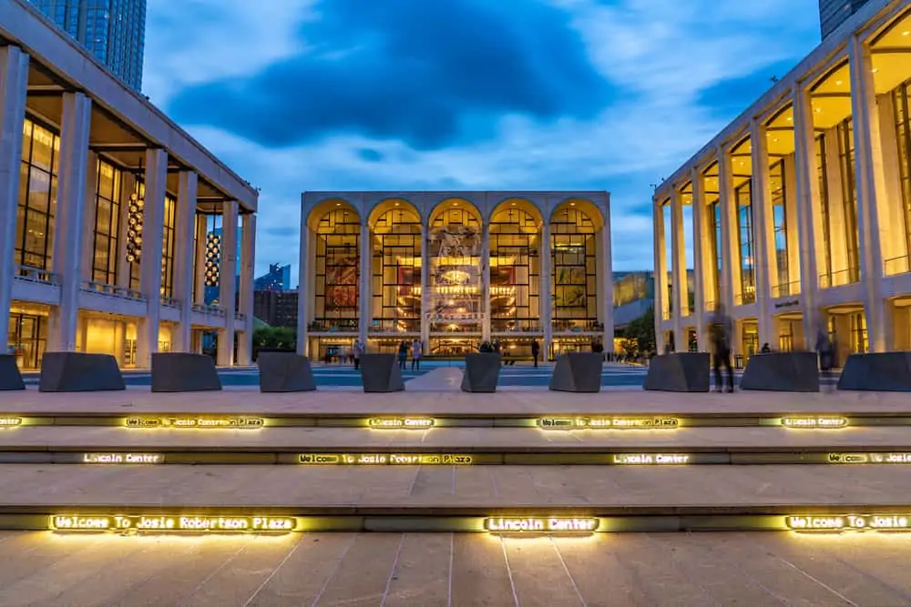 This is an evening view of the the Lincoln Center of Performing Arts in Manhattan