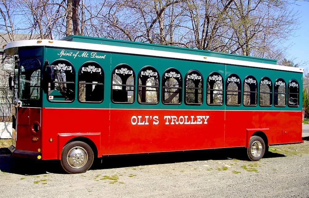 The vibrant red and green Oli's Trolley in Bar Harbor, Maine. 