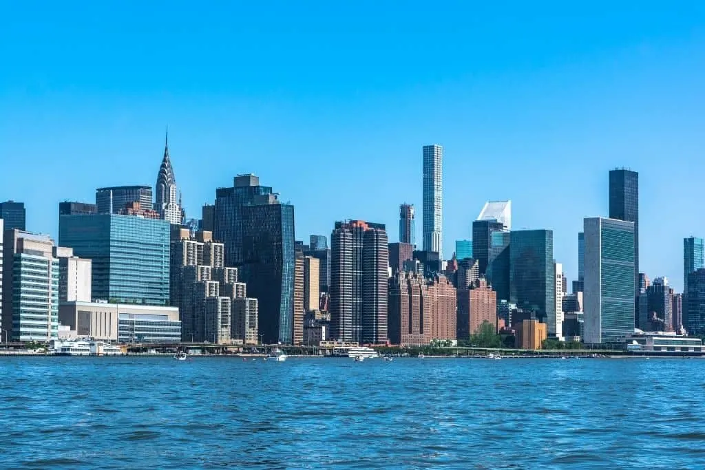 View of the Manhattan skyline from the East River since a ferry is one of the best things to do on the Upper East Side NYC
