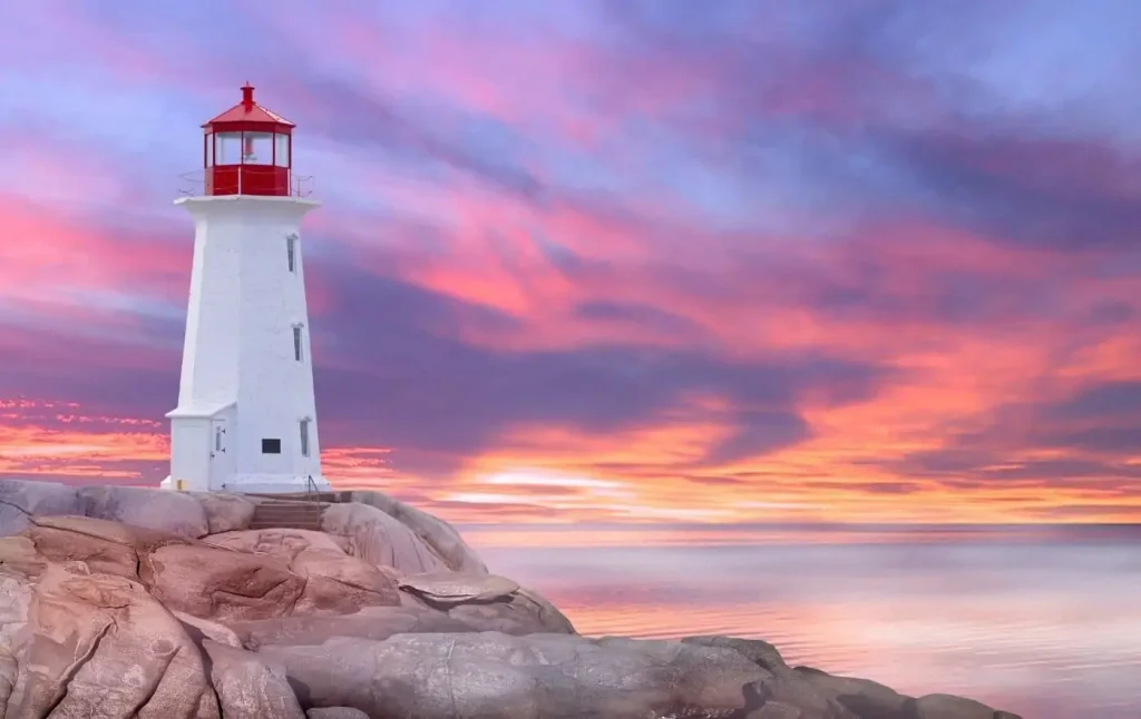 Lighthouse at sunset in Peggy's Covbe in St. Margaret's Bay in Nova Scotia, one of the best provinces to live in Canada. 