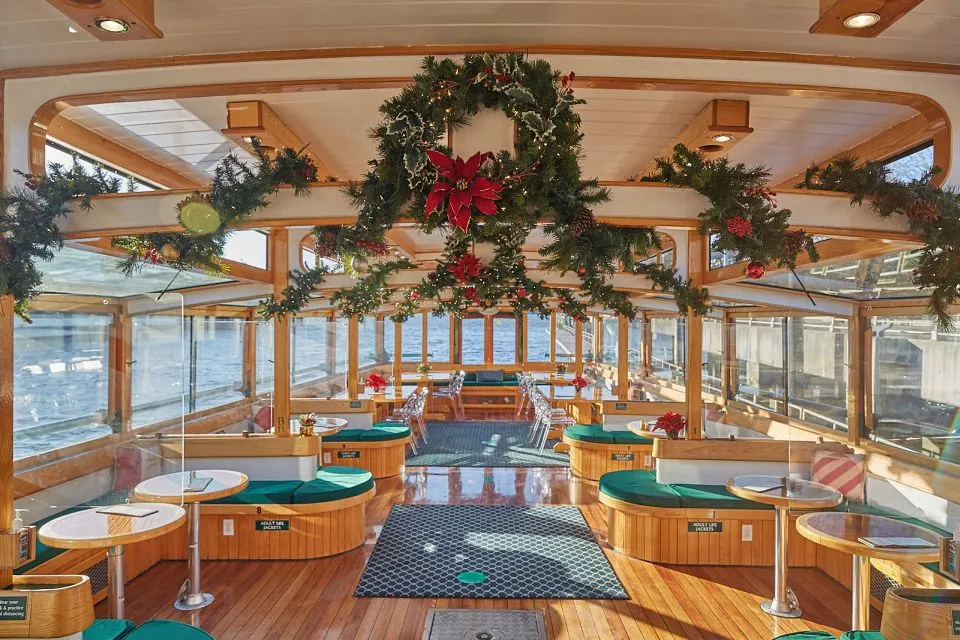 1920's style boat with holiday decor on New York Harbor.