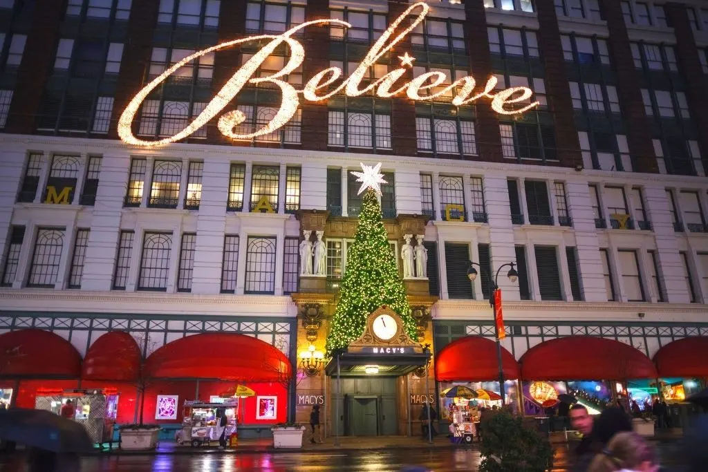Best Christmas lights in New York City at Macy's Herald Square with a Christmas Tree and a huge "Believe" sign. 