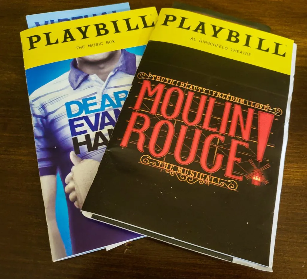 Broadway playbills from the shows Moulin Royge and Dear Evan Hansen, one of the best souvenirs from New York. 