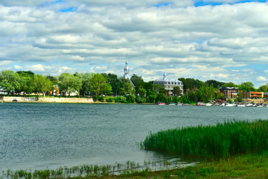 he marina of Boucherville at islands of Boucherville national park in Lawrence (Laurent) River, Montreal, QC on a cloudy summer day. One of the best cities to live in Canada. 