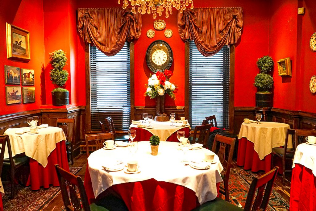 The red dining room of the king's carriage house, One of many great New York City date ideas. 