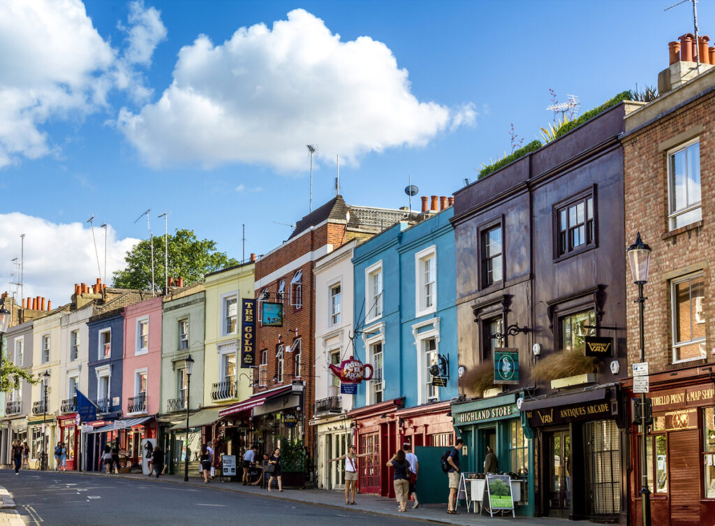 View of the shops on Portobello Road in Notting Hill, one of the most famous streets in London. 