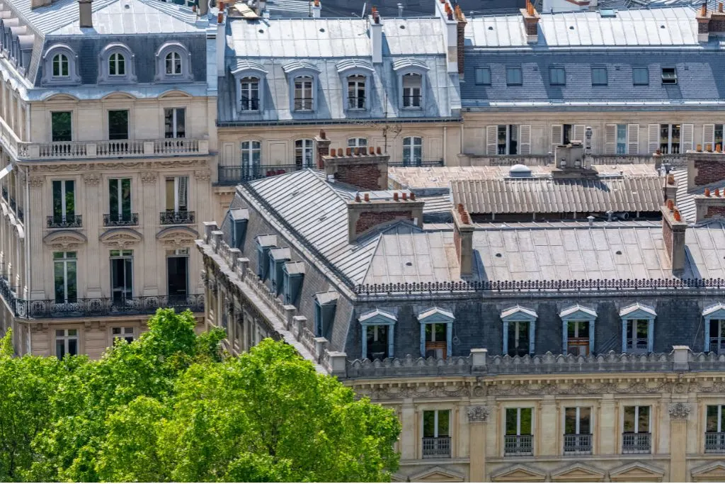 Aerial view of iconic Haussmann-style architecture on one of the most famous streets in Paris. 