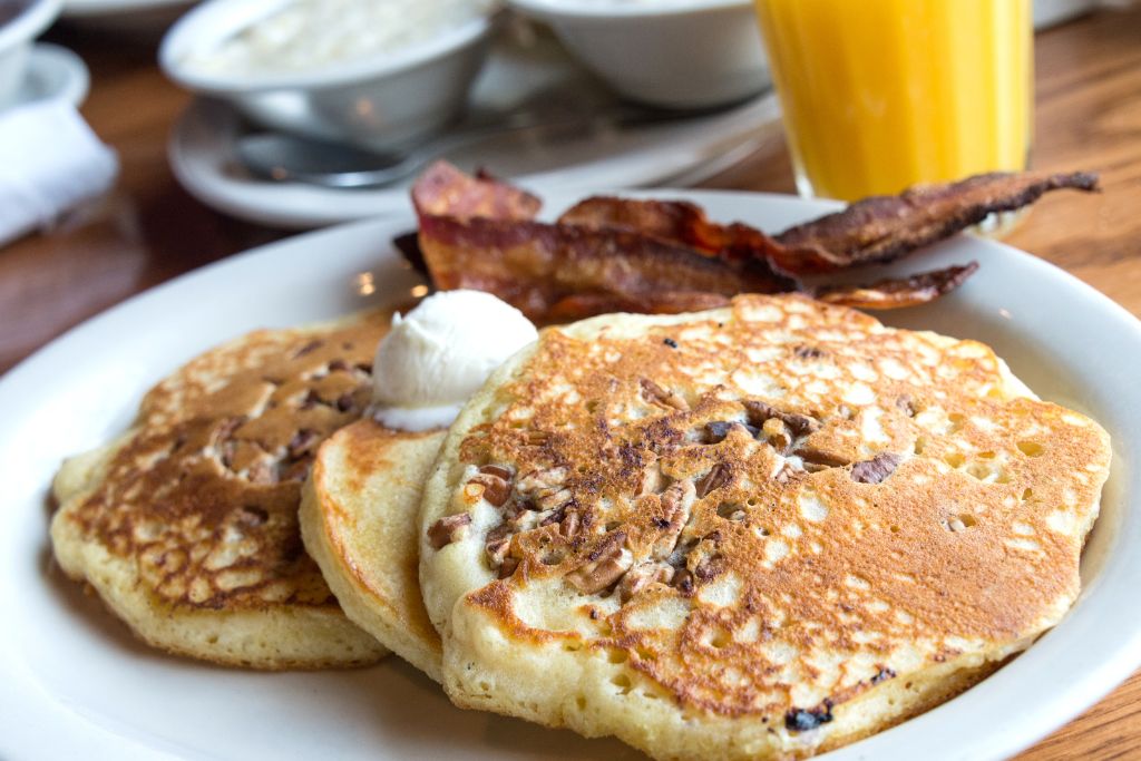 Frech hotcakes with a side of bacon easily make for one of the best brunch in Vancouver. 