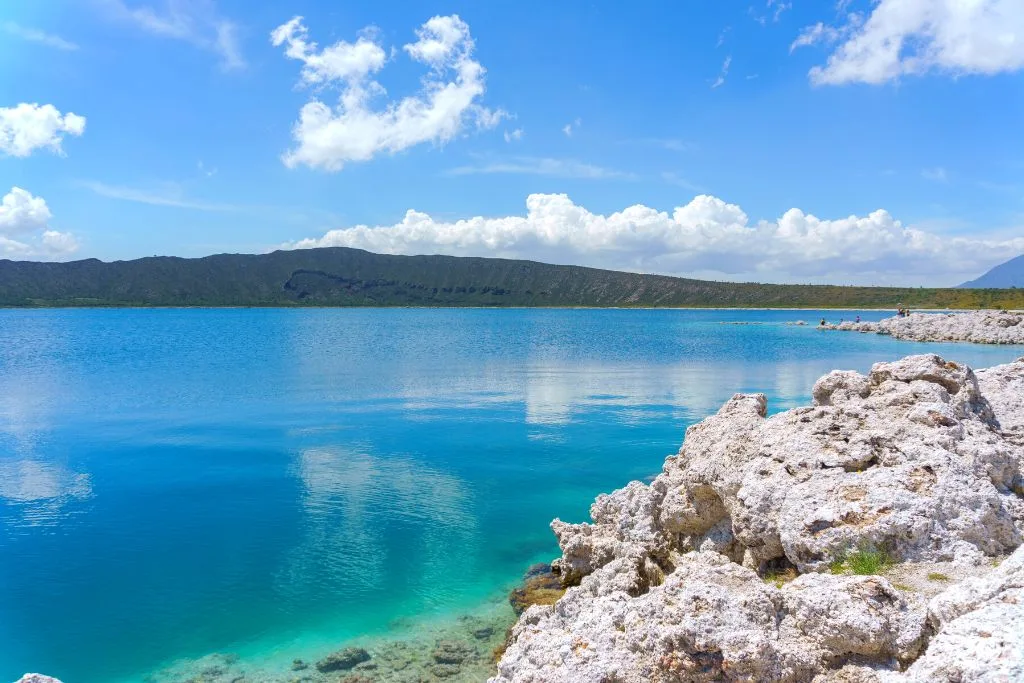 The stunning blue waters of and rocky shores of Laguna de Alchichica, one of the best lakes Mexico has to offer. 