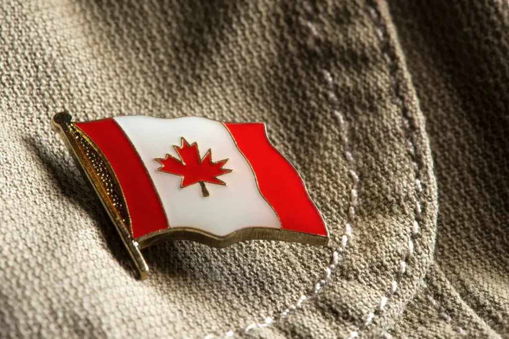 Canada flag pin on someone's shirt and one of the Canada souvenirs of them all. 