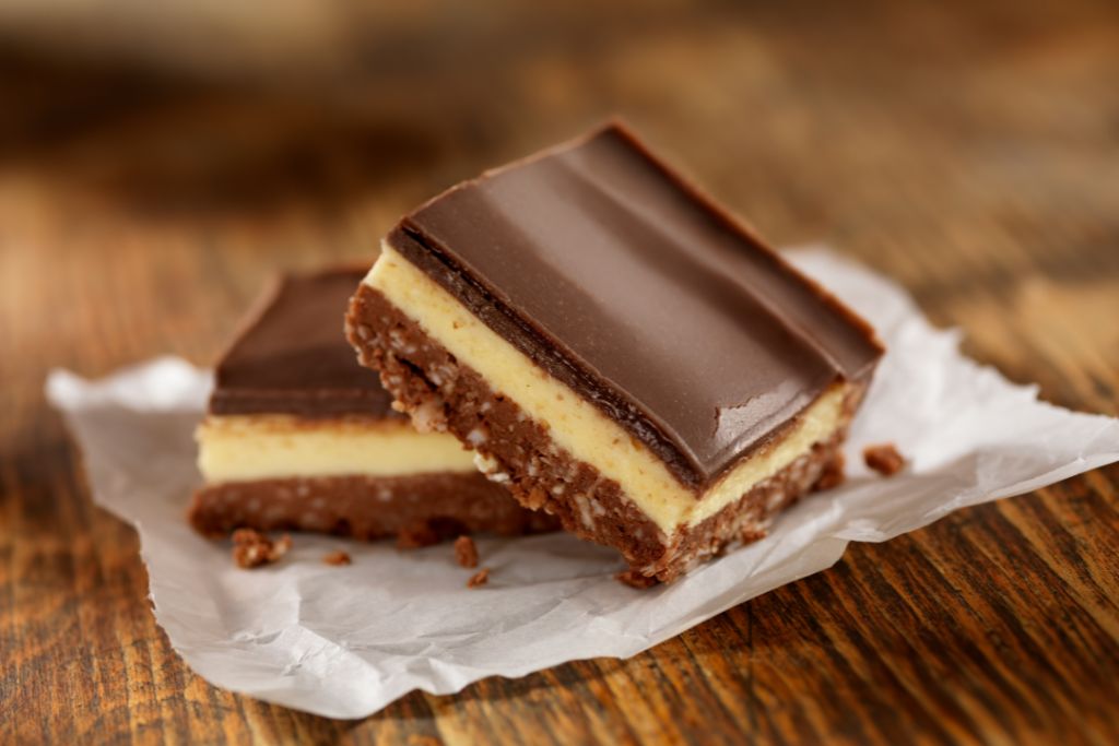 Nanaimo Bars with chocolate on top make for one of the top souvenirs from Canada. 