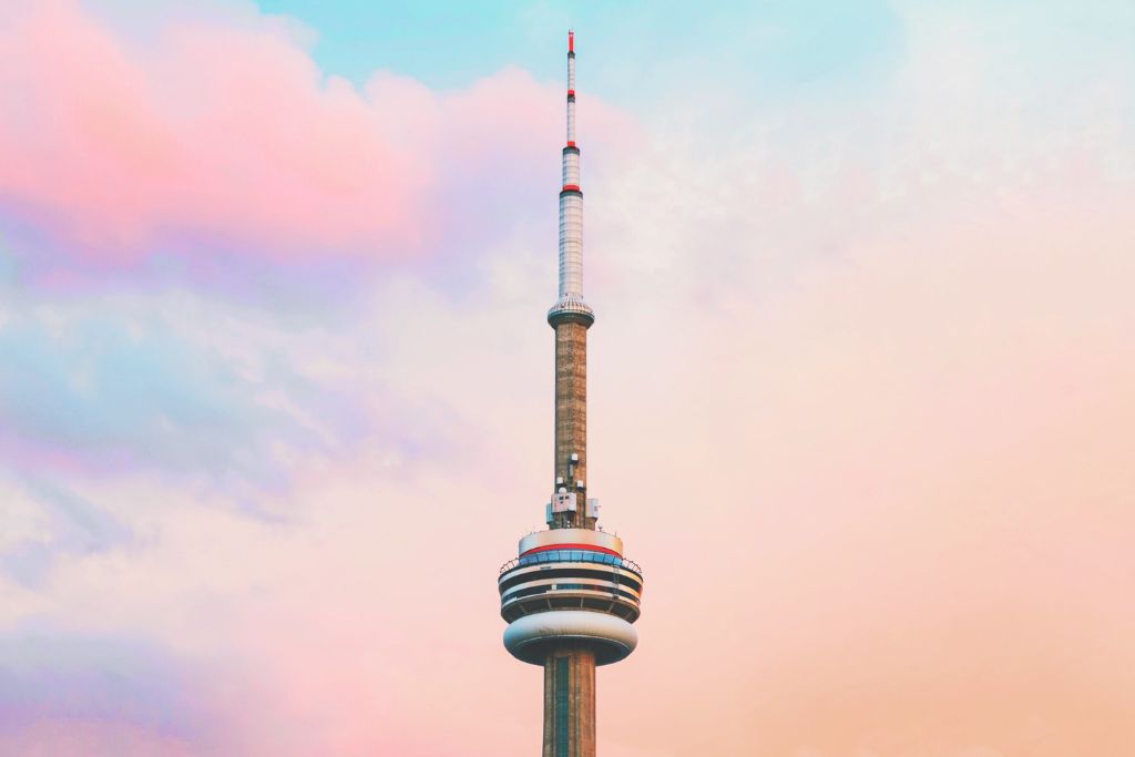 View of the CN Toiwer at sunset since the edgewalk is one of the cool things to do in Toronto.