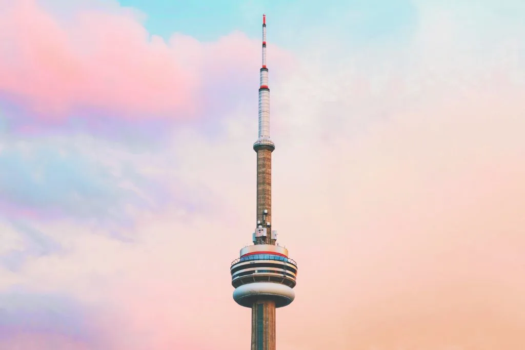 View of the CN Toiwer at sunset since the edgewalk is one of the cool things to do in Toronto.