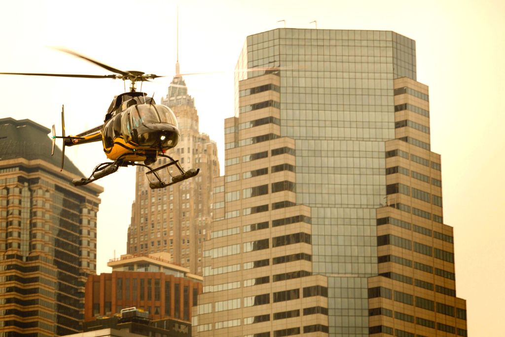 Helicopter flying through New York City during one of the best NYC helicopter tours of them all. 