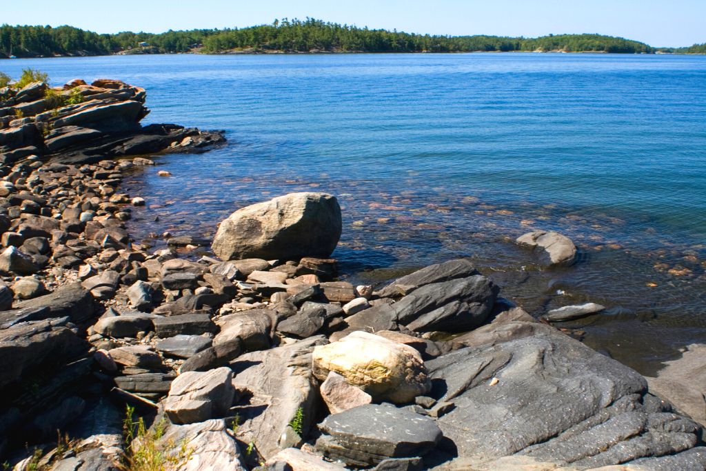View of the water and the rocky shores of Killbear Provincial Park, one of the top Ontario beaches. 