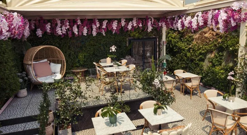 Charming flower-embued restaurant at ODSweet Duomo Milano. 