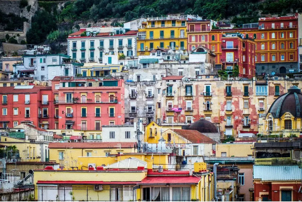 Some of the colorful homes that you'll find in the Spanish Quarter of Naples before you set out on the best Amalfi Coast tours from Naples. 