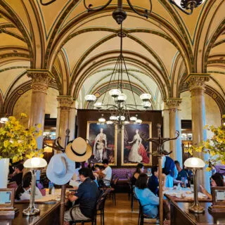Lavish interior of Cafe Central which serves the best sachertorte in Vienna.