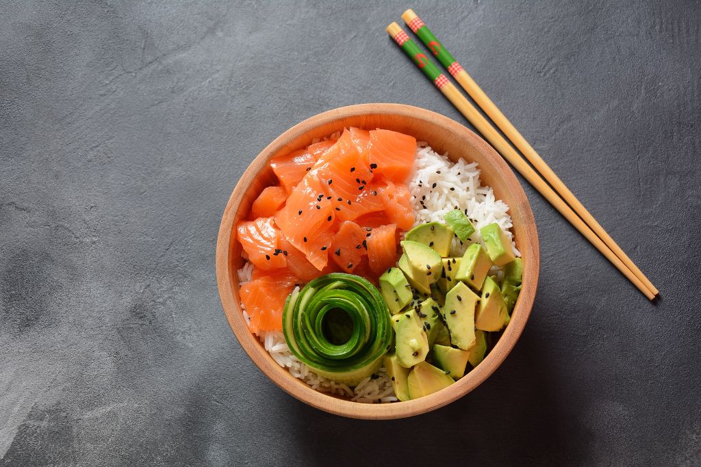 Salmon poke bowl with rice and avocado from one of the best Japanese cafes in London