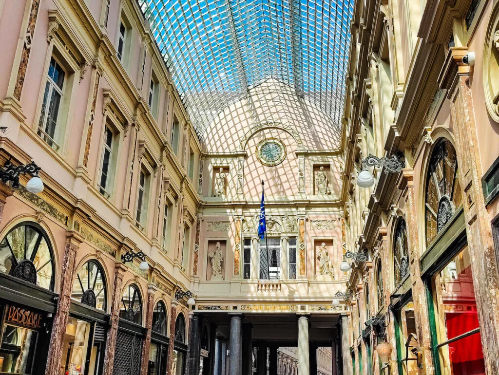 The pink hues and glass ceilings of Royal Gallery of Saint Hubert in Brussels. 